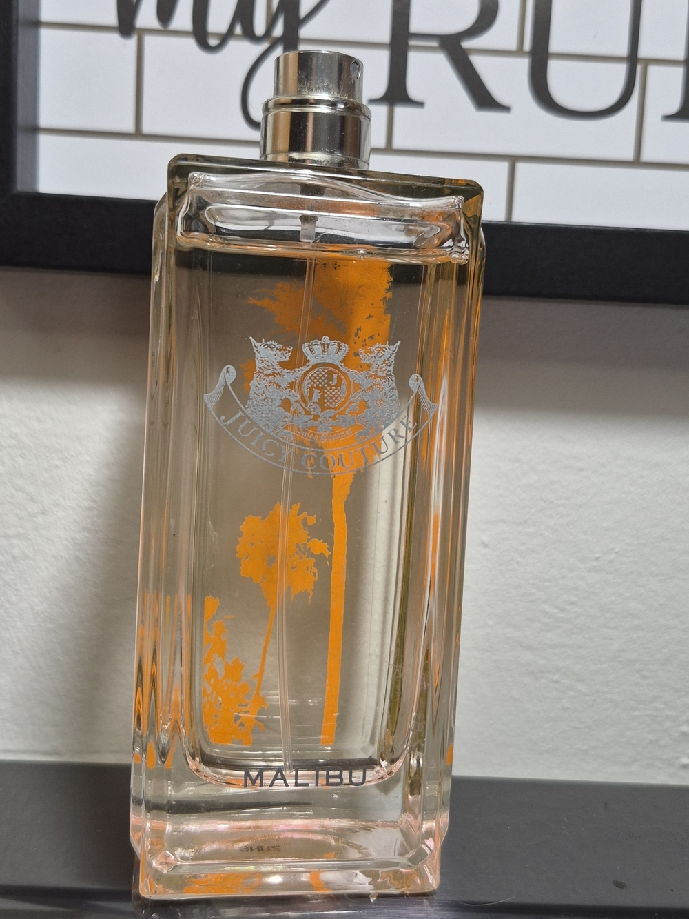 Large Juicy Couture Malibu Women's Fragrance Bottle with Orange Accents